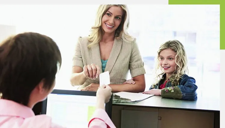 Women With A Smile Sitting In A Clinic