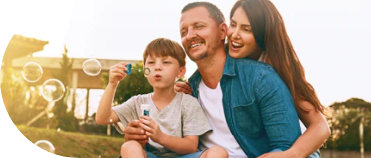 happy family blowing bubbles