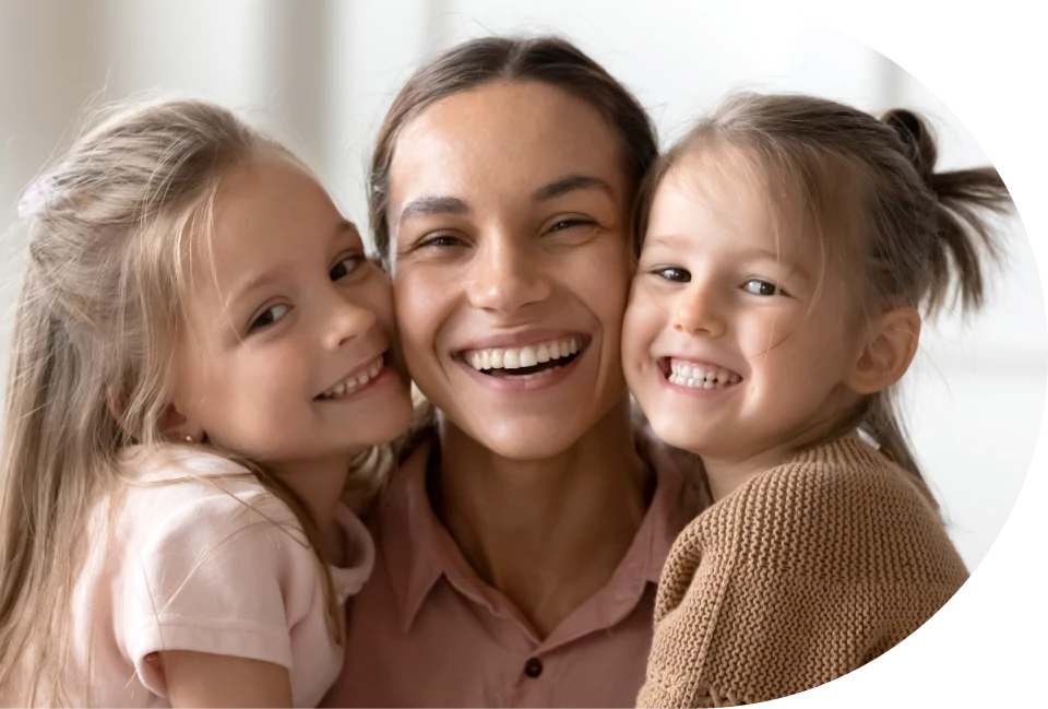 happy mother with daughters